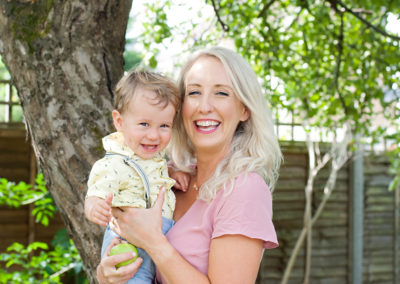 mother and son smiling in family shoot surrey