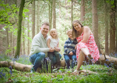 family in bluebells in Farnham